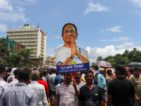 A large cutout of TMC supremo CM Mamata Banerjee is being seen at the annual martyrs' day rally held by the TMC party in Kolkata, India, on...