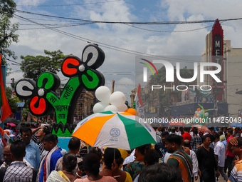 People are attending the annual Martyrs' Day rally held by the TMC party in Kolkata, India, on July 21, 2024. (