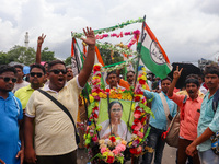 People are attending the annual Martyrs' Day rally held by the TMC party in Kolkata, India, on July 21, 2024. (