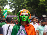 A man is wearing a colored mask during the annual Martyrs' Day rally held by the TMC party in Kolkata, India, on July 21, 2024. (