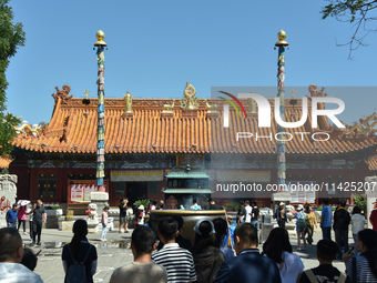 Tourists are visiting Wuliang Temple in Hohhot, Inner Mongolia, China, on July 4, 2024. (