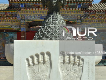 Tourists are visiting Wuliang Temple in Hohhot, Inner Mongolia, China, on July 4, 2024. (