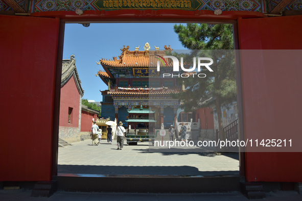 Tourists are visiting Wuliang Temple in Hohhot, Inner Mongolia, China, on July 4, 2024. 