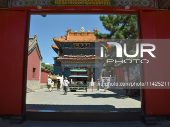 Tourists are visiting Wuliang Temple in Hohhot, Inner Mongolia, China, on July 4, 2024. (