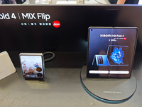 Customers are experiencing two fold-screen phones newly released by Xiaomi at a Xiaomi Home in Shanghai, China, on July 21, 2024. (