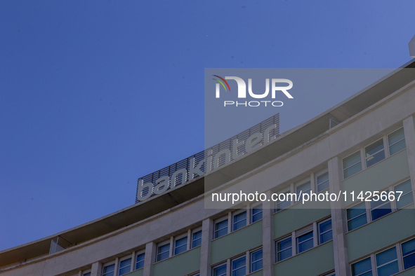 A bank logo is being seen on top of a building in Lisbon, Portugal, on July 21, 2024. An interruption of Microsoft systems, related to the c...