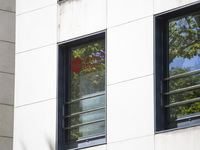 A Crypto store logo is being seen on a building in Lisbon, Portugal, on July 21, 2024. An interruption of Microsoft systems, related to the...