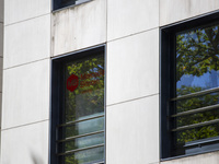 A Crypto store logo is being seen on a building in Lisbon, Portugal, on July 21, 2024. An interruption of Microsoft systems, related to the...