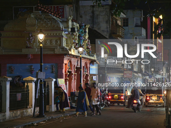 A busy street is bustling in the East Fort area during the night of the Vishu Festival in Thiruvananthapuram (Trivandrum), Kerala, India, on...