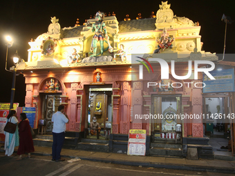 Devotees are offering prayers at the Sree Hanuman Swamy Temple during the night of the Vishu Festival in Thiruvananthapuram (Trivandrum), Ke...