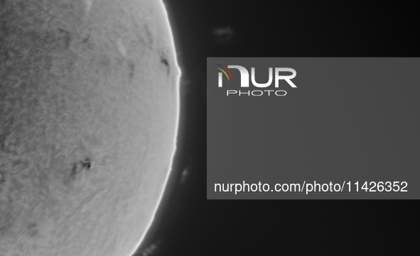 (EDITOR'S NOTE: This image was captured with an H-Alpha solar telescope and is the result of stacking the best 20% of frames. The final stac...