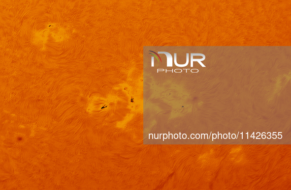 (EDITOR'S NOTE: This image was captured with an H-Alpha solar telescope and is the result of stacking the best 20% of frames. The final stac...