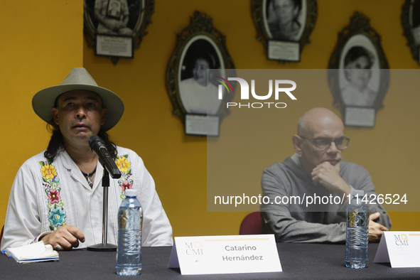 Catarino Hernandez (left), son of Carmelo Cortes, and Luis Carlos Pichardo Moreno (right), director of the Casa de la Memoria Indomita Museu...