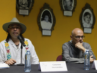 Catarino Hernandez (left), son of Carmelo Cortes, and Luis Carlos Pichardo Moreno (right), director of the Casa de la Memoria Indomita Museu...