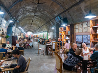 Residents are drinking tea at an old teahouse in a bomb shelter as the high temperature continues in Chongqing, China, on July 21, 2024. (