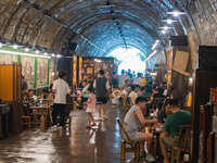 Residents are drinking tea at an old teahouse in a bomb shelter as the high temperature continues in Chongqing, China, on July 21, 2024. (