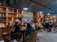 Residents are drinking tea at an old teahouse in a bomb shelter as the high temperature continues in Chongqing, China, on July 21, 2024. (