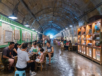 Residents are drinking tea at an old teahouse in a bomb shelter as the high temperature continues in Chongqing, China, on July 21, 2024. (