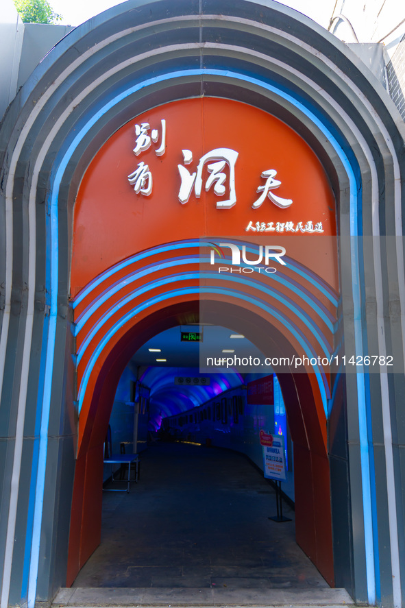 Citizens are cooling off in a bomb shelter as the high temperature continues in Chongqing, China, on July 21, 2024. 