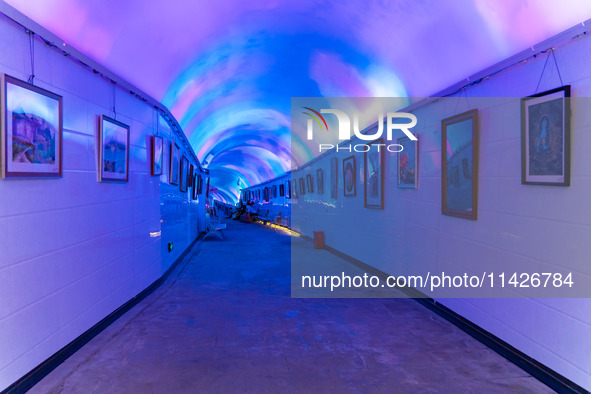 Citizens are cooling off in a bomb shelter as the high temperature continues in Chongqing, China, on July 21, 2024. 