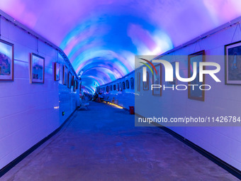 Citizens are cooling off in a bomb shelter as the high temperature continues in Chongqing, China, on July 21, 2024. (