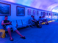 Citizens are cooling off in a bomb shelter as the high temperature continues in Chongqing, China, on July 21, 2024. (