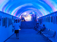 Citizens are cooling off in a bomb shelter as the high temperature continues in Chongqing, China, on July 21, 2024. (