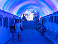 Citizens are cooling off in a bomb shelter as the high temperature continues in Chongqing, China, on July 21, 2024. (