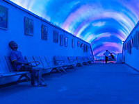 Citizens are cooling off in a bomb shelter as the high temperature continues in Chongqing, China, on July 21, 2024. (