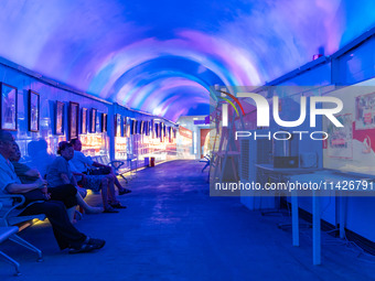 Citizens are cooling off in a bomb shelter as the high temperature continues in Chongqing, China, on July 21, 2024. (