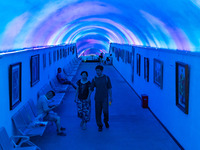 Citizens are cooling off in a bomb shelter as the high temperature continues in Chongqing, China, on July 21, 2024. (