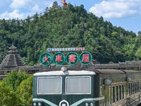 Students are reading in a green lacquered ''train book house'' in Yuping county, Guizhou province, China, on July 21, 2024. (