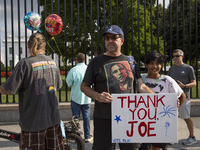 A visitor is holding a sign with the words ''Thank You Joe'' in front of the White House in Washington, DC, USA, on July 21, 2024. The day J...