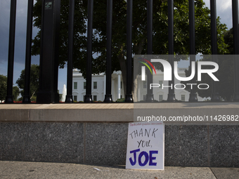 A sign is being seen with the words ''Dedicated Public Servant Thank You Joe'' in front of the White House, Washington, DC, USA, on July 21,...