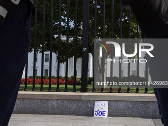 A sign is being seen with the words ''Dedicated Public Servant Thank You Joe'' in front of the White House, Washington, DC, USA, on July 21,...