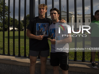 Donald Trump supporters are posing for photographs in front of the White House in Washington, DC, USA, on July 21, 2024. The day Joe Biden i...