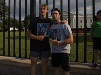 Donald Trump supporters are posing for photographs in front of the White House in Washington, DC, USA, on July 21, 2024. The day Joe Biden i...