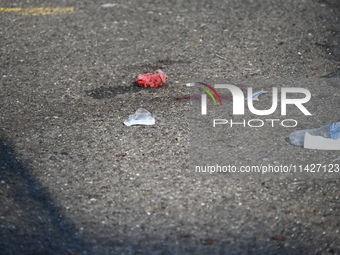 Blood is at the crime scene. A person is being knocked unconscious during a fight, and the suspect is being arrested in Newark, New Jersey,...