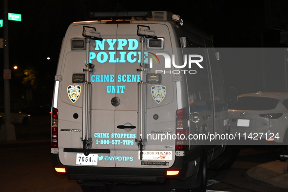 The crime scene unit is on the scene. A man is being shot in the head and killed in Bronx, New York, United States, on July 21, 2024. At app...