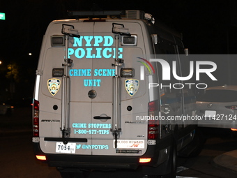 The crime scene unit is on the scene. A man is being shot in the head and killed in Bronx, New York, United States, on July 21, 2024. At app...