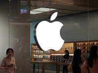 Customers are trying on and learning about Apple Vision Pro headsets at an Apple store in Shanghai, China, on July 22, 2024. (