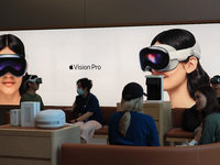 Customers are trying on and learning about Apple Vision Pro headsets at an Apple store in Shanghai, China, on July 22, 2024. (