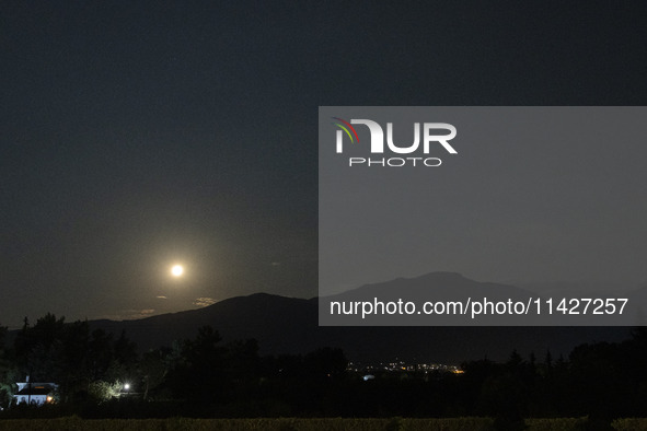 The Full Moon of July 2024 known as Buck Moon or Thunder Moon spotted over Mount Olympus in Greece. Mount Olympus is a National Park with th...