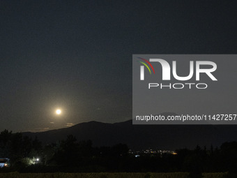 The Full Moon of July 2024 known as Buck Moon or Thunder Moon spotted over Mount Olympus in Greece. Mount Olympus is a National Park with th...