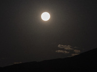 The Full Moon of July 2024 known as Buck Moon or Thunder Moon spotted over Mount Olympus in Greece. Mount Olympus is a National Park with th...