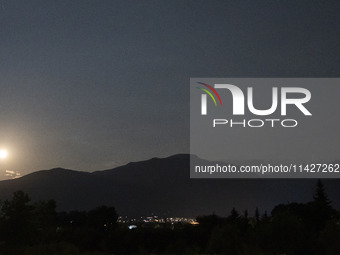 The Full Moon of July 2024 known as Buck Moon or Thunder Moon spotted over Mount Olympus in Greece. Mount Olympus is a National Park with th...