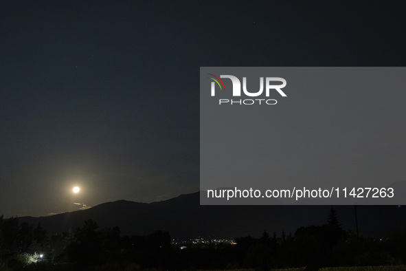 The Full Moon of July 2024 known as Buck Moon or Thunder Moon spotted over Mount Olympus in Greece. Mount Olympus is a National Park with th...