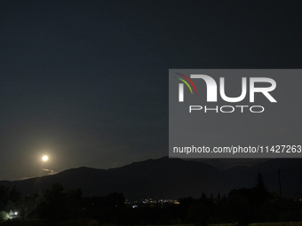 The Full Moon of July 2024 known as Buck Moon or Thunder Moon spotted over Mount Olympus in Greece. Mount Olympus is a National Park with th...