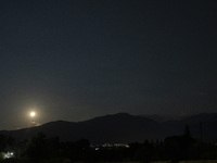 The Full Moon of July 2024 known as Buck Moon or Thunder Moon spotted over Mount Olympus in Greece. Mount Olympus is a National Park with th...