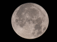 Close up of  the Full Moon of July 2024 known as Buck Moon or Thunder Moon spotted over Mount Olympus in Greece. Mount Olympus is a National...